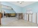 Unfinished living room with exposed framework, showcasing natural light at 434 W Grace St, Punta Gorda, FL 33950