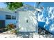 Enclosed white storage shed featuring double doors and secure locking hardware for added security at 434 W Grace St, Punta Gorda, FL 33950