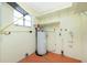 A practical utility room with a modern water heater, ready for any appliance at 434 W Grace St, Punta Gorda, FL 33950