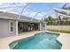 A beautiful screened-in pool area with a dining set, ideal for relaxation and entertainment at 4571 La Rosa Ave, North Port, FL 34286