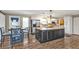 Spacious kitchen with a large island, stainless steel appliances, and ample counter space, ideal for cooking and dining at 5211 Prime Ter, North Port, FL 34286