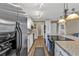 Modern kitchen with stainless steel appliances and granite countertops at 5211 Prime Ter, North Port, FL 34286