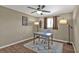 Cozy office with a large window and wood flooring offers ample natural light at 5211 Prime Ter, North Port, FL 34286