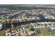 Aerial view of waterfront homes in a lovely residential community with canals and mature trees at 556 Monaco Dr, Punta Gorda, FL 33950