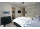 Bright bedroom with ensuite bathroom, ceiling fan, and large closet at 556 Monaco Dr, Punta Gorda, FL 33950