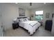 Cozy bedroom featuring a comfortable bed, nautical themed decor and a sunlit window view at 556 Monaco Dr, Punta Gorda, FL 33950