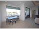 Cozy dining area with water views and access to the lanai at 556 Monaco Dr, Punta Gorda, FL 33950