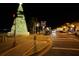 Festive street view with a decorated Christmas tree, holiday lights, and neighborhood atmosphere at 556 Monaco Dr, Punta Gorda, FL 33950