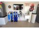 Utility room with water filtration system, sink, and TV at 556 Monaco Dr, Punta Gorda, FL 33950