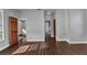 A bedroom with wood floors, closet, and natural light at 5601 Taylor Rd, Punta Gorda, FL 33950