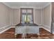 A beautifully decorated room featuring decorative molding and wood floors at 5601 Taylor Rd, Punta Gorda, FL 33950