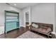 Sitting room with natural light, love seat, and built-in bookshelf at 5601 Taylor Rd, Punta Gorda, FL 33950