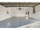 Clean and spacious garage with ample room for parking and storage, plus a utility sink at 6938 Rabbit Ave, North Port, FL 34291