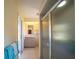 Bright bathroom showcasing a glass-enclosed shower and tiled floor at 825 Robinhood Dr, Punta Gorda, FL 33982