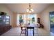 Dining room with natural light, large windows, and tile floor at 825 Robinhood Dr, Punta Gorda, FL 33982