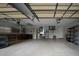Spacious garage area with ample storage space and work area at 825 Robinhood Dr, Punta Gorda, FL 33982