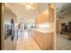 Kitchen leading into breakfast nook with stainless steel refrigerator at 825 Robinhood Dr, Punta Gorda, FL 33982