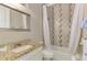 Bathroom with a shower-tub combination and a granite vanity at 10393 Harlingen St, Port Charlotte, FL 33981
