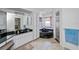 Bathroom with a tub, walk-in shower, and granite countertops at 1169 Presque Isle Dr, Port Charlotte, FL 33952
