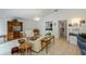 Cozy living room features tile floors, neutral paint, and a built-in entertainment center at 1169 Presque Isle Dr, Port Charlotte, FL 33952
