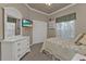 Serene bedroom with a view, storage, and a TV for relaxation at 1350 Old Oak Trl, Port Charlotte, FL 33948