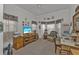 Cozy living room featuring a work area, a TV, and decorative accents at 1350 Old Oak Trl, Port Charlotte, FL 33948