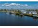 Waterfront homes along a canal offer picturesque views and convenient boating access at 137 Poinsettia Ne Cir, Port Charlotte, FL 33952