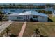 Charming home features a well-maintained front lawn and an attached one-car garage at 137 Poinsettia Ne Cir, Port Charlotte, FL 33952