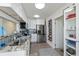 Modern kitchen with stainless steel appliances, sleek countertops, and white cabinetry at 137 Poinsettia Ne Cir, Port Charlotte, FL 33952