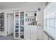 Well-organized pantry featuring shelving, food storage, and easy access to kitchen essentials at 137 Poinsettia Ne Cir, Port Charlotte, FL 33952