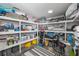 Spacious storage room with built-in white shelving, perfect for organizing all your belongings at 137 Poinsettia Ne Cir, Port Charlotte, FL 33952
