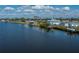 Scenic waterfront home featuring a private boat dock and stunning canal views at 137 Poinsettia Ne Cir, Port Charlotte, FL 33952