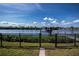 Gated waterway view showing the lush greenery of the backyard landscaping at 137 Poinsettia Ne Cir, Port Charlotte, FL 33952