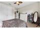 Comfortable bedroom featuring a closet, an organized dresser, and ample space at 1470 Atwater Dr, North Port, FL 34288