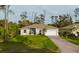 Charming single-story home with a well-manicured lawn, attached garage, and inviting curb appeal at 1470 Atwater Dr, North Port, FL 34288