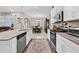 Bright kitchen with stainless appliances and view of the breakfast nook and backyard at 1470 Atwater Dr, North Port, FL 34288