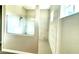Spacious tiled shower with frameless glass enclosure and modern fixtures at 15155 Scarlet Oak Ct, Punta Gorda, FL 33955
