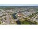 Expansive aerial view showcasing the home's location within a charming neighborhood surrounded by waterways at 2255 Easy St, Port Charlotte, FL 33952