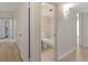 Bathroom features a shower-tub combo with tile surround, a toilet, and a modern vanity at 2255 Easy St, Port Charlotte, FL 33952
