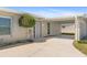 Charming single-story home featuring a covered carport and well-maintained landscaping, enhancing curb appeal at 2255 Easy St, Port Charlotte, FL 33952