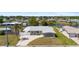 Single-story home with a well-manicured front yard at 2255 Easy St, Port Charlotte, FL 33952