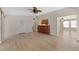 Spacious living room features light-colored flooring with natural light and an open floor plan at 2255 Easy St, Port Charlotte, FL 33952