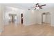 Open living room features light-colored flooring and views to other rooms in the home at 2255 Easy St, Port Charlotte, FL 33952