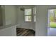 Inviting dining area with stylish light fixture and large windows offering scenic views at 23490 Macbeth Ct, Punta Gorda, FL 33980
