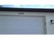 The garage door of this home at 23490 has impact resistant windows at 23490 Macbeth Ct, Punta Gorda, FL 33980