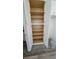 A spacious pantry with adjustable shelving providing ample storage space, located in the kitchen area at 23490 Macbeth Ct, Punta Gorda, FL 33980