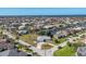 Expansive aerial shot of homes situated on canals, showcasing the waterfront community and sunny skies at 2501 Rio Grande Dr, Punta Gorda, FL 33950