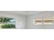 Bright bedroom featuring natural light with two windows at 2501 Rio Grande Dr, Punta Gorda, FL 33950