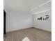Spacious bedroom with large window and tile flooring at 2501 Rio Grande Dr, Punta Gorda, FL 33950