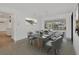 Elegant dining room with modern table setting and view to the backyard at 2501 Rio Grande Dr, Punta Gorda, FL 33950